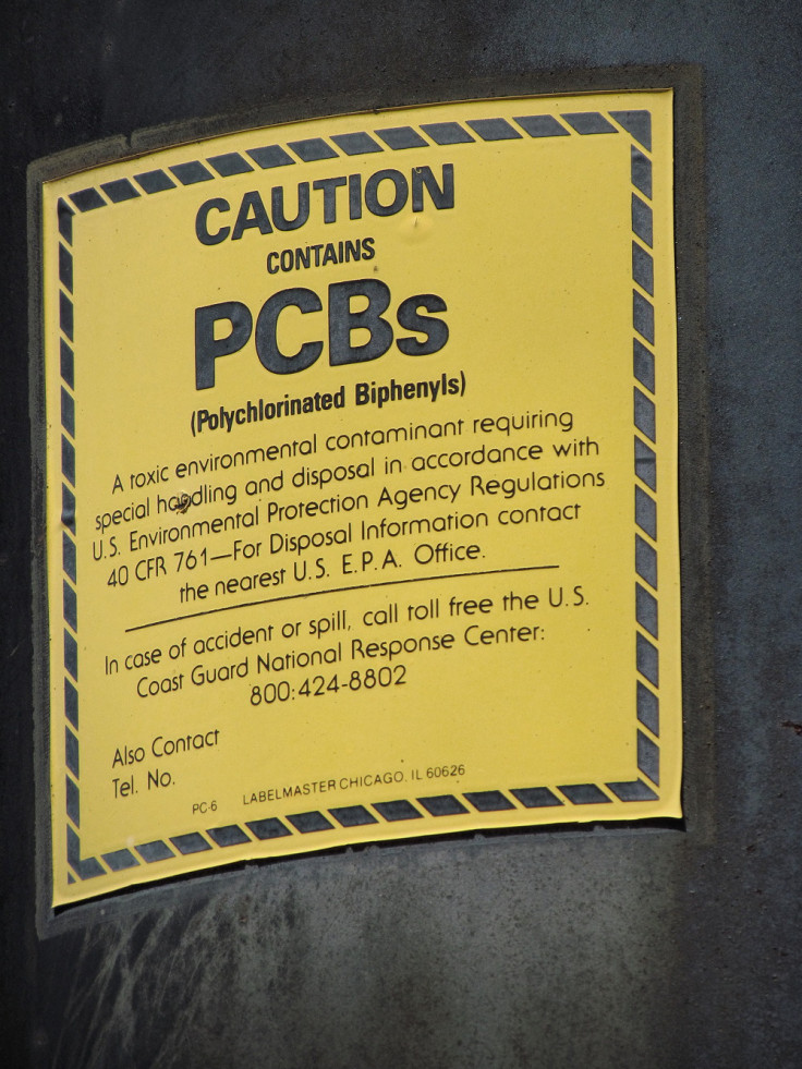caution contains pcbs