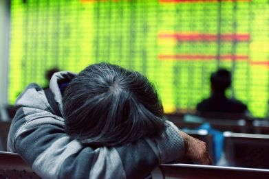 Asian stocks slide
