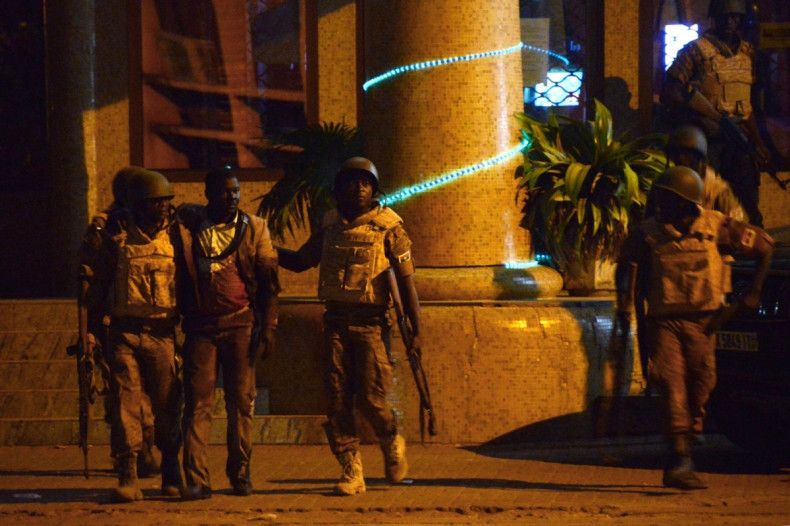 Burkina Faso Splendid Hotel soldiers and man