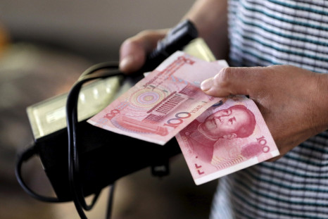 China warns George Soros on going to "war on the renminbi"