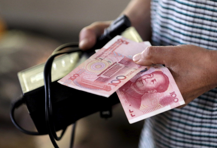 China warns George Soros on going to "war on the renminbi"