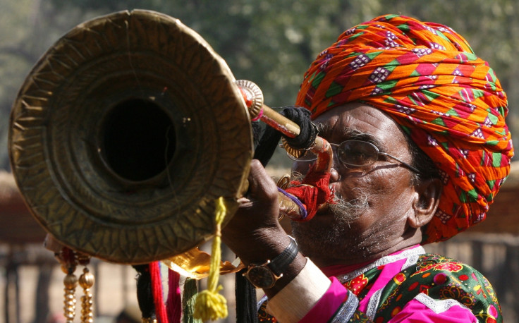 Man blowing horn