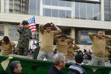 Iranians re-enact the arrest of US sailors