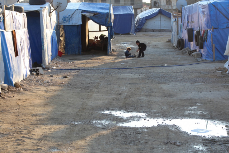 Two children play in the street