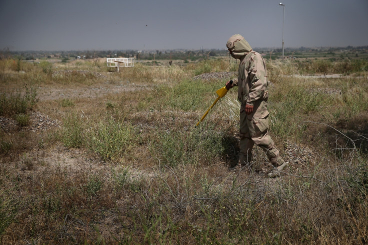 An Iraqi soldier tests for chemical weaponS