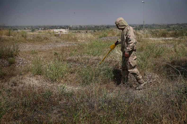 An Iraqi soldier tests for chemical weaponS