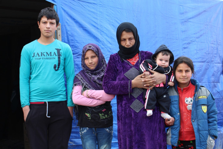 Mouamar and her family in the Bekaa