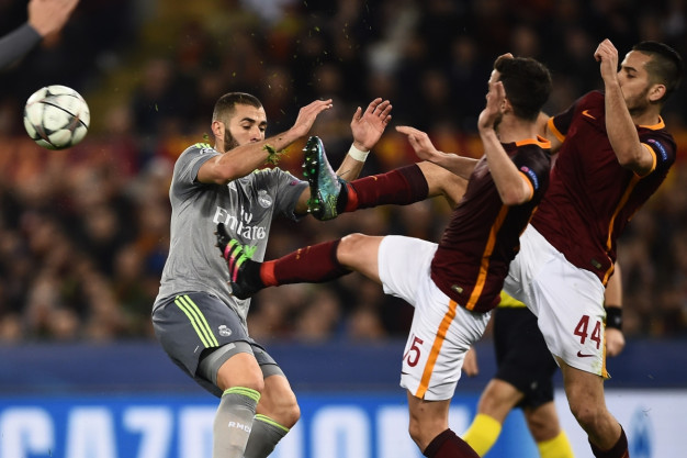Roma and Madrid players battle Roma and Madrid players battle