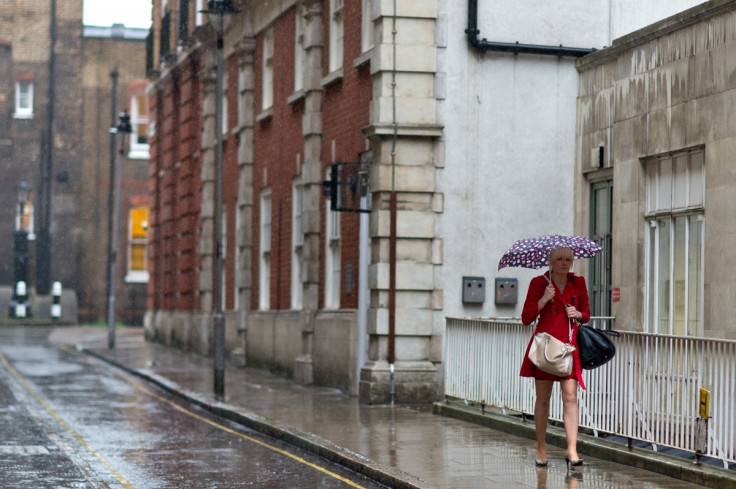 Woman walking in the rain