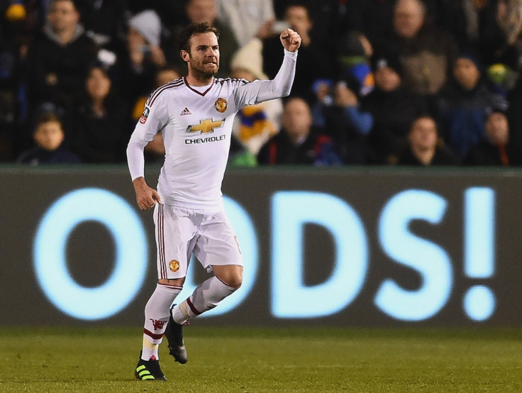 Juan Mata celebrates his goal