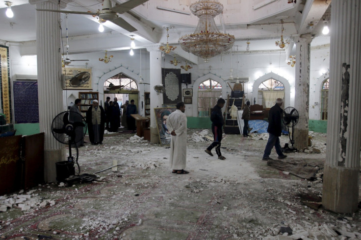 People gather at a Shiite mosque