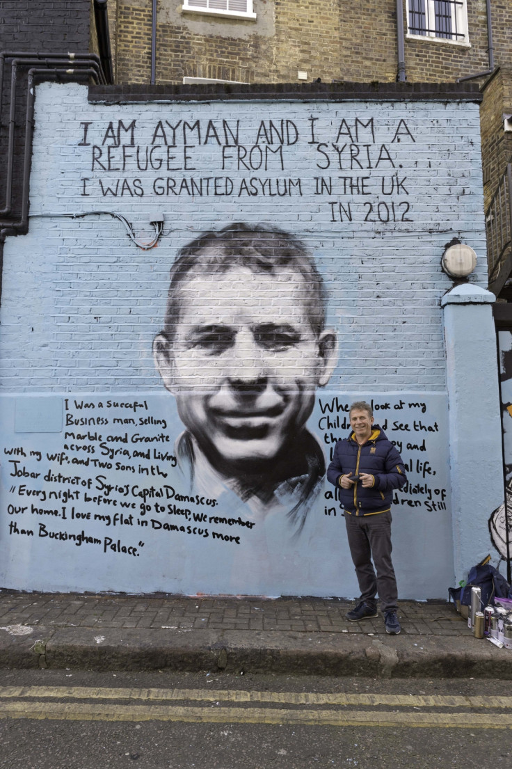 red cross mural of syrian refugee