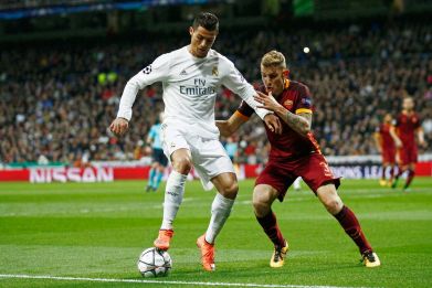 Ronaldo protects the ball from a defender