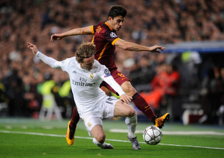 Modric fights for the ball
