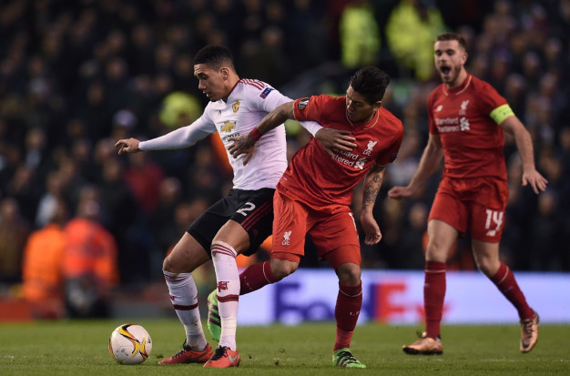 Chris Smalling scraps for the ball Chris Smalling scraps for the ball