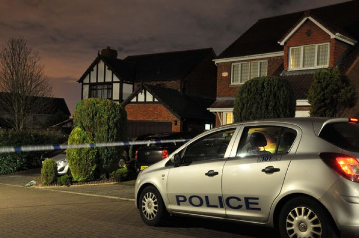 Police outside the twins' home in Dalgety Bay, Fife