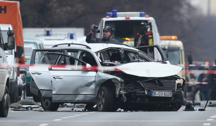 Investigators at the scene of today's carbombexplosioninBerlin