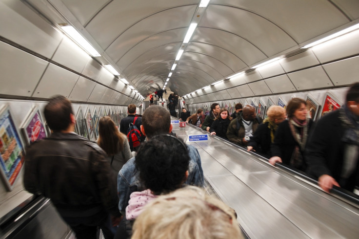 Tube London Underground escalator commuters