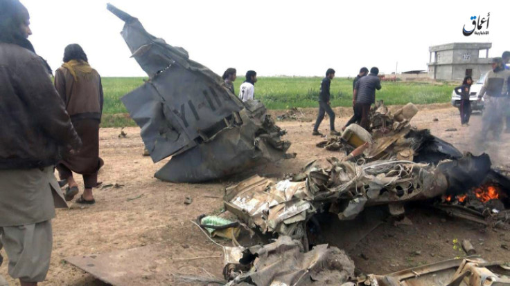 Fighters combing through the wreckage