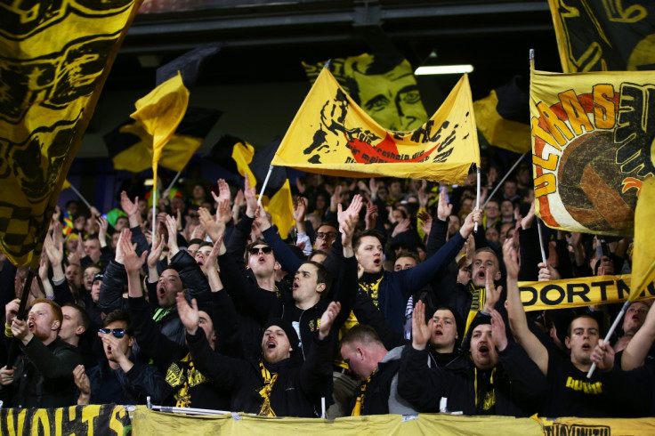 Dortmund fans celebrate at the Lane