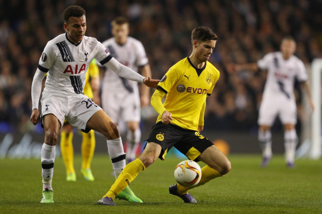 Dele Alli tries to win the ball Dele Alli tries to win the ball