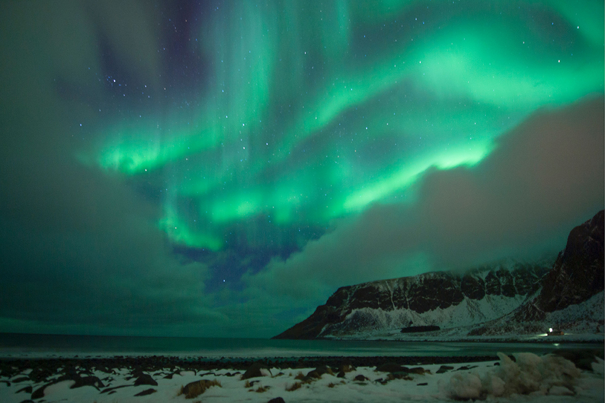 Norway: Stunning photos of surfers under the northern lights in the ...