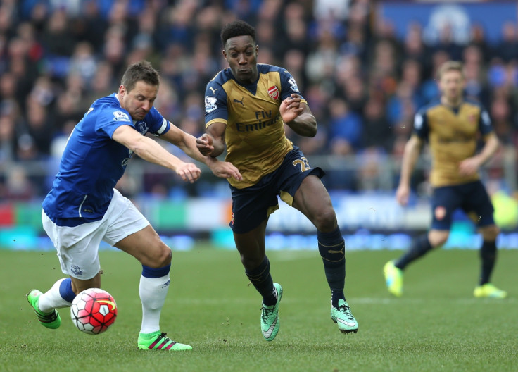 Danny Welbeck scraps for the ball