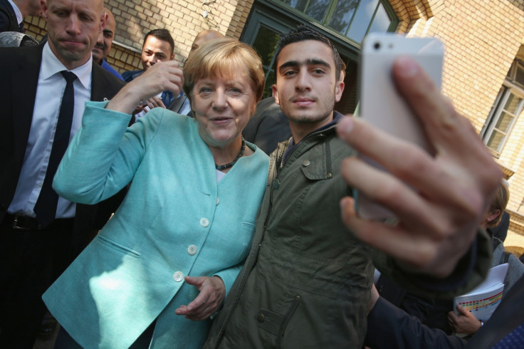 Angela Merkel migrants shelter selfie 