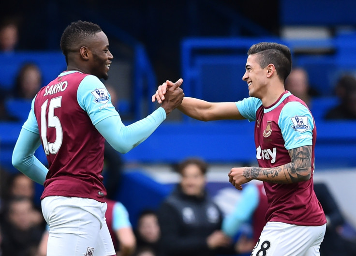 Sakho and Lanzini celebrate