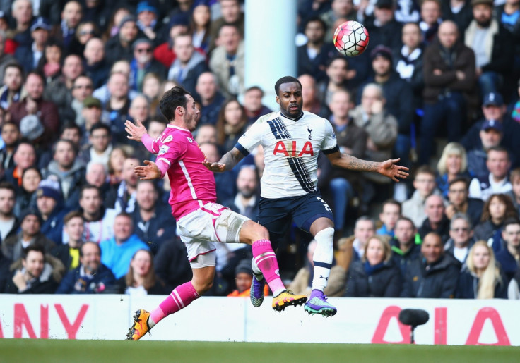 Adam Smith (left) and Danny Rose battle