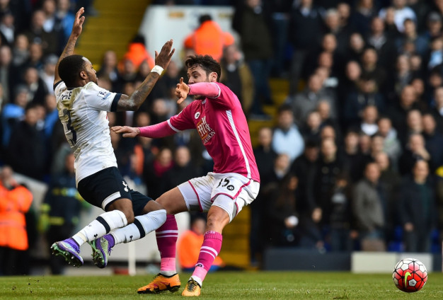 Danny Rose goes down under a tackle Danny Rose goes down under a tackle