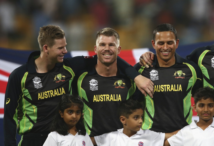 The Aussie players laugh during the anthems