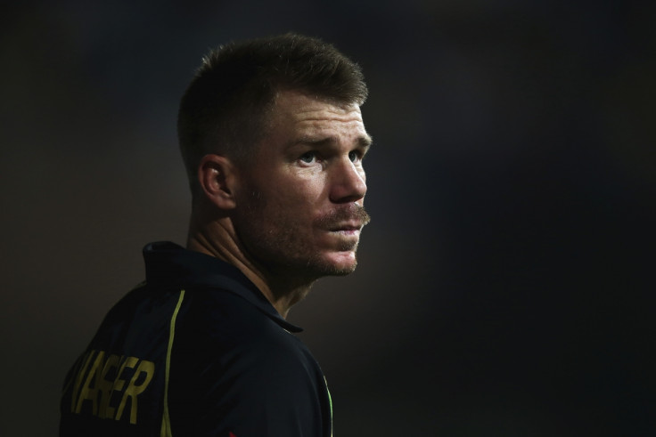 David Warner watches on from the boundary