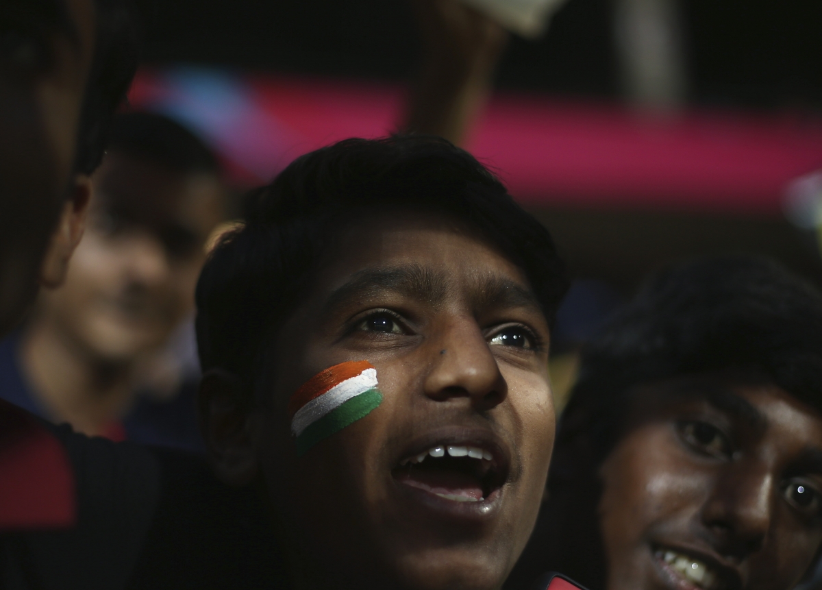 A fan cheers in Bangalore A fan cheers in Bangalore