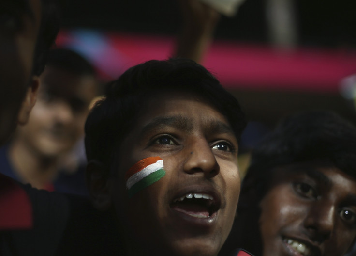 A fan cheers in Bangalore