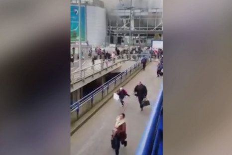 Brussels: Twitter video shows crowds fleeing Zaventem airport after deadly explosions