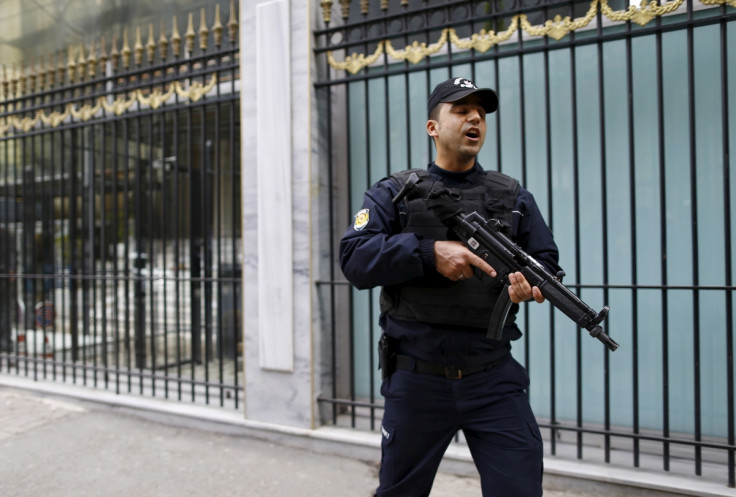 A Turkish police officer stands guard outsidethe