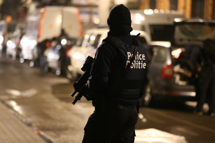 Police officers take part in an operation in Schaerbeek