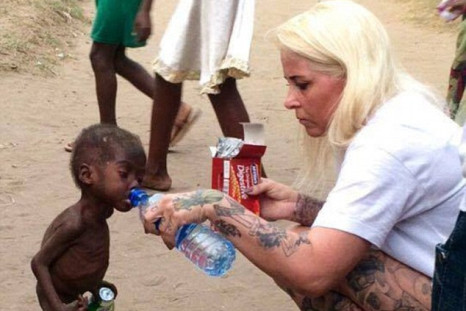 Anja Ringgren Loven cares for Nigerian child
