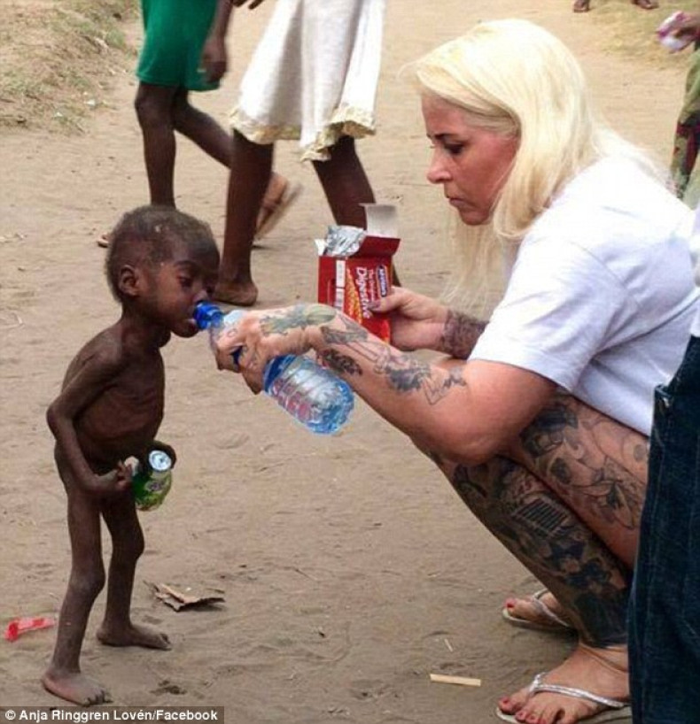 Anja Ringgren Loven cares for Nigerian child