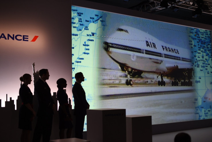 Air France flight attendants looks at a slide show in New York June 25, 2014.