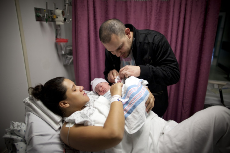 Newborn baby with parents