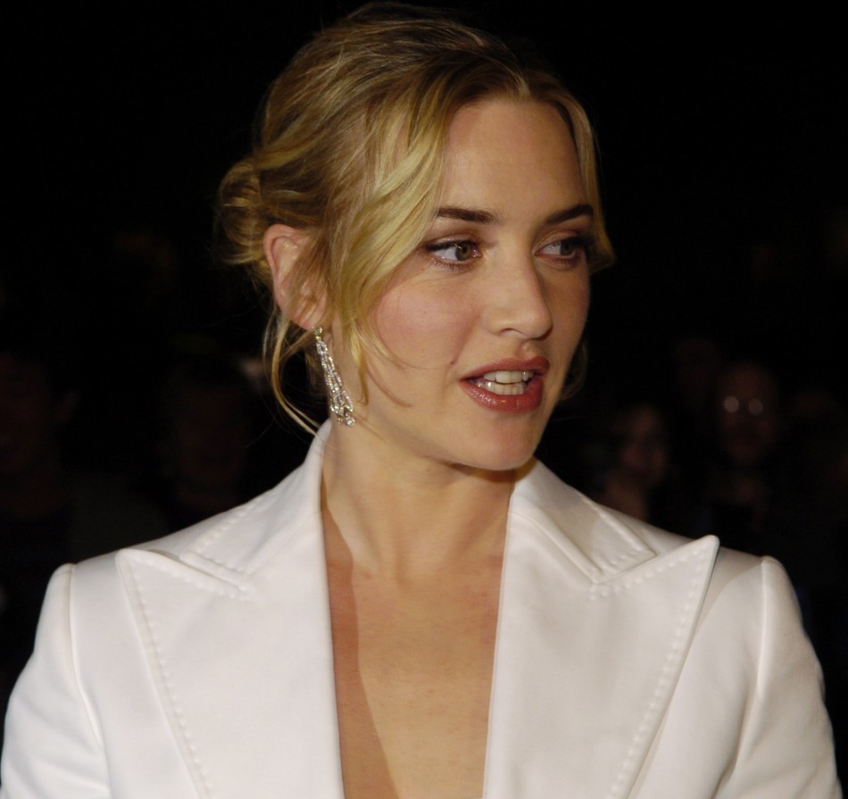 Actress Kate Winslet poses as she arrives at the 20th Annual Santa Barbara International Film Festival