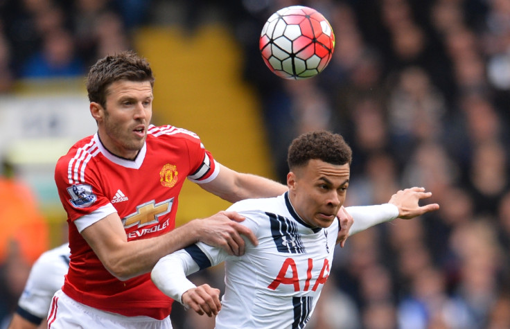 Michael Carrick (left) in action against Spurs