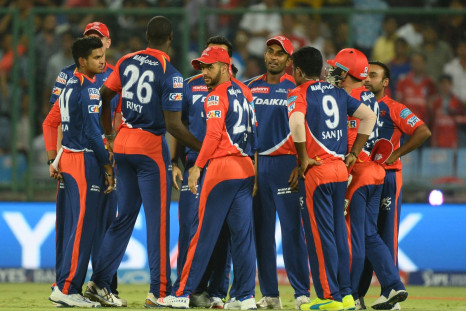 Delhi players celebrate a wicket