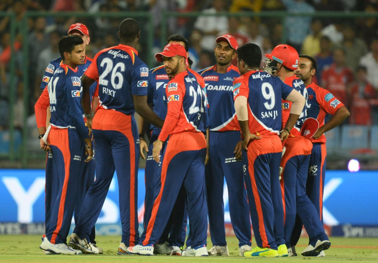 Delhi players celebrate a wicket