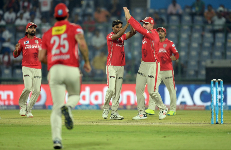 Sharma celebrates taking a wicket
