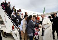 Pope Francis greets refugee families in Rome