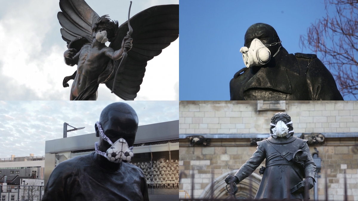 Greepeace mask statues