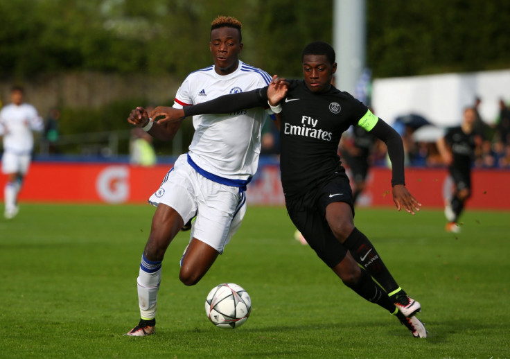 Tammy Abraham (left) fights for the ball